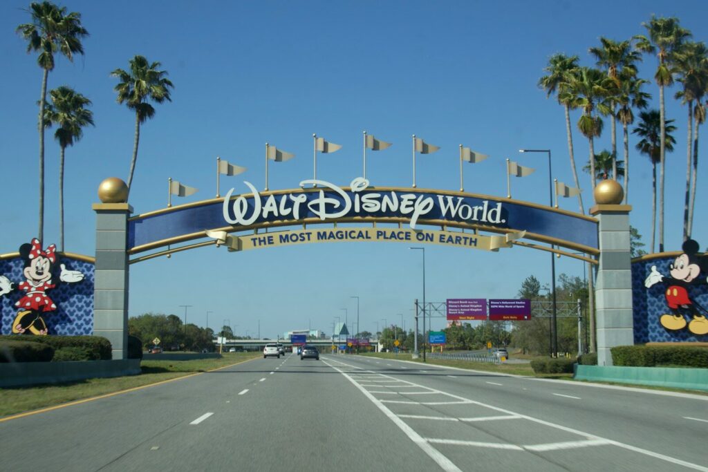Walt disney world entrance with mickey and minnie mouse statues